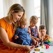 Arrange play dates with other children or involve siblings in play activities at home. Arrange play dates with other children or involve siblings in play activities at home.