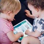 Toddlers and under-fives are naturally drawn to electronic screens. But how much is good for them?